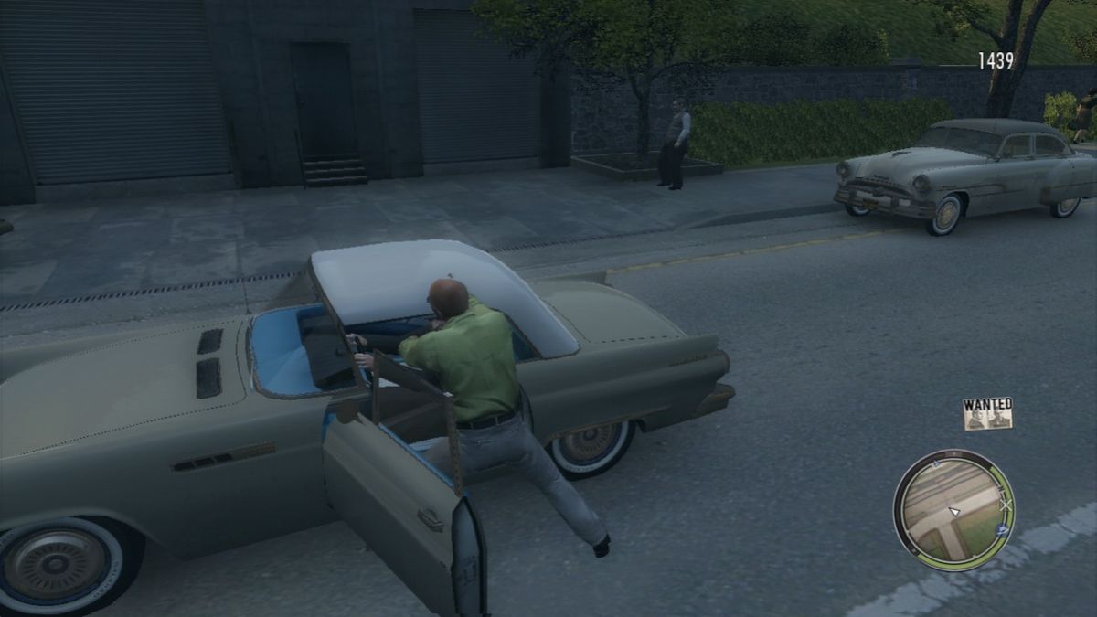 Mafia II: The Betrayal of Jimmy (PlayStation 3) screenshot: Taking the car by force