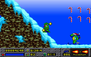 Jazz Jackrabbit: Holiday Hare 1994 (DOS) screenshot: A turtle skiing is wearing Santa's hat