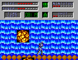 The Cyber Shinobi (SEGA Master System) screenshot: A boulder coming down at you