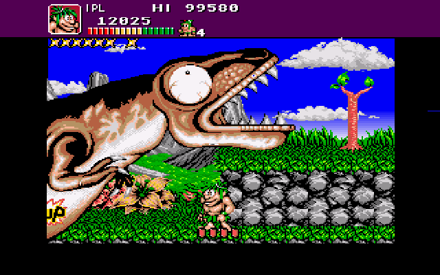 Joe & Mac: Caveman Ninja (Amiga) screenshot: Hurt the dinosaur