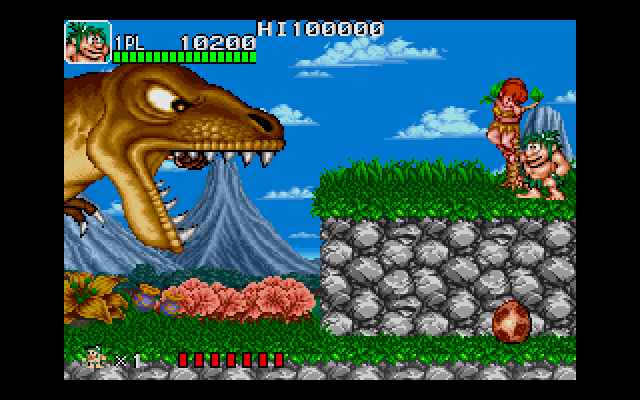 Joe & Mac: Caveman Ninja (DOS) screenshot: First boss - a big & bad dinosaur.