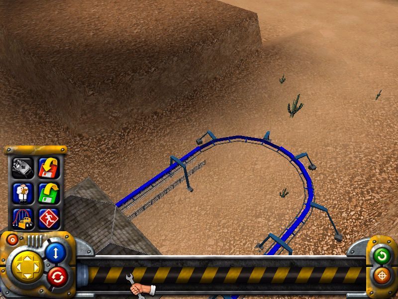 Roller Coaster Mania (Windows) screenshot: A track has been completed and immediately this menu pops up. The options are save, load, exit, ride the track (greyed out), test the track and demolish the track