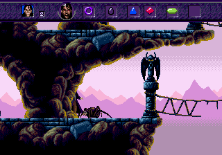 Warlock (Genesis) screenshot: You hide behind the rock, hoping the giant spider won't notice you