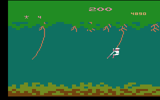 Jungle Hunt (Atari 2600) screenshot: Swinging from vine to vine