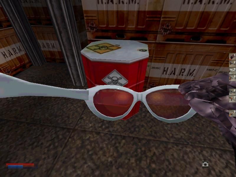 The Operative: No One Lives Forever (Windows) screenshot: No secret agent man...or woman...would be complete without gadgets, such as their innocent looking sunglasses that can take photos, zoom in on enemies, or detect mines and lasers