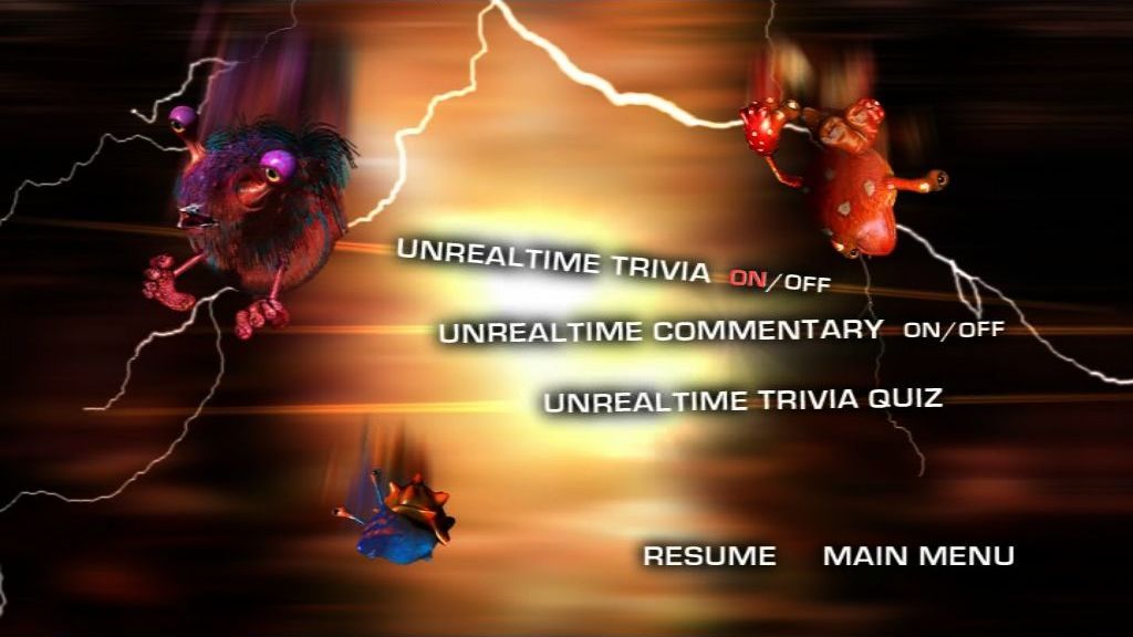 Ross Noble: Unrealtime (included game) (DVD Player) screenshot: The DVD Extras menu. The performance must be watched with the Unrealtime trivia option enabled to have any chance of later completing the quiz successfully