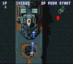 Aero Fighters (SNES) screenshot: The boss of level 2 is a boat