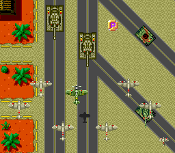 Twin Hawk (TurboGrafx CD) screenshot: Battle on a highway. Power-ups are floating liberally