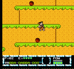 The Flintstones: The Surprise at Dinosaur Peak! (NES) screenshot: Fred evading rocks.