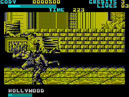 Final Fight (ZX Spectrum) screenshot: Cody's flying kick didn't stop this guy