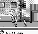 Turok 2: Seeds of Evil (Game Boy Color) screenshot: In the first segment, you walk down the street avoiding these guys. (Game Boy)