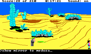 King's Quest III: To Heir is Human (TRS-80 CoCo) screenshot: In the desert; watch out, Medusa approaches!