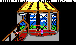 King's Quest III: To Heir is Human (TRS-80 CoCo) screenshot: Be careful, the wizard is watching...