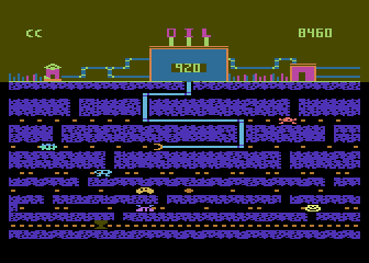 Oil's Well (Atari 8-bit) screenshot: Don't let the critters attack your pipe!