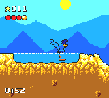 Desert Speedtrap starring Road Runner and Wile E. Coyote (Game Gear) screenshot: Standing in the water and enjoying the sun is my idea of fun