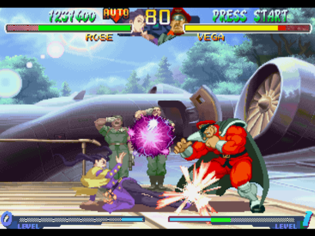 Street Fighter Alpha 2 (PlayStation) screenshot: Before to be damaged by Vega (M. Bison)'s Psycho Shot, Rose injuries him with her Sliding move.
