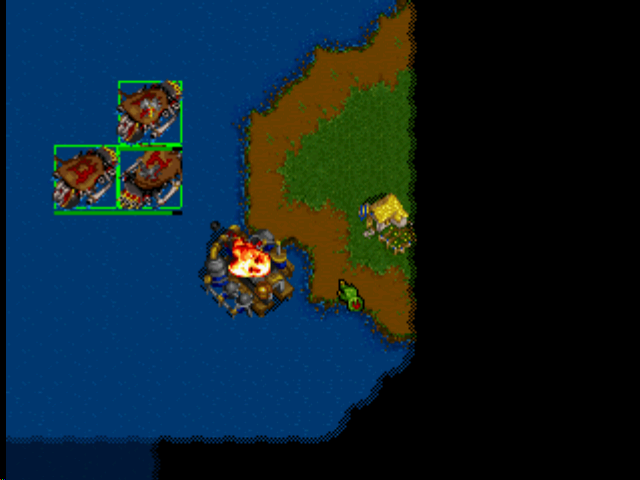 WarCraft II: The Dark Saga (PlayStation) screenshot: The orcs destroy a human shipyard.