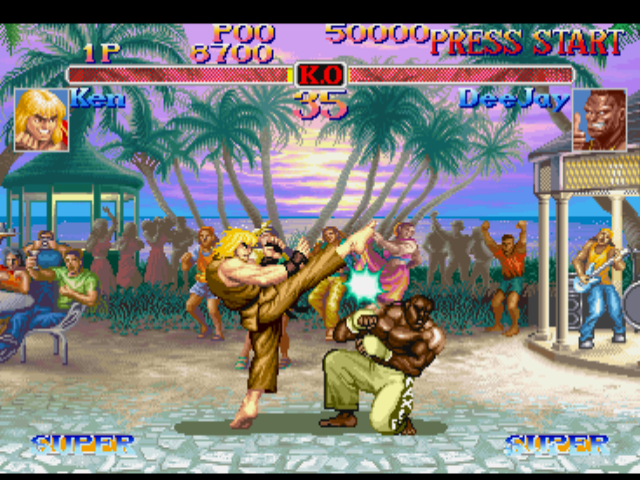 Street Fighter Collection (PlayStation) screenshot: Taking full advantage of his new Osoto Mawashi-geri move, Ken Masters attacks a crouched Dee Jay.