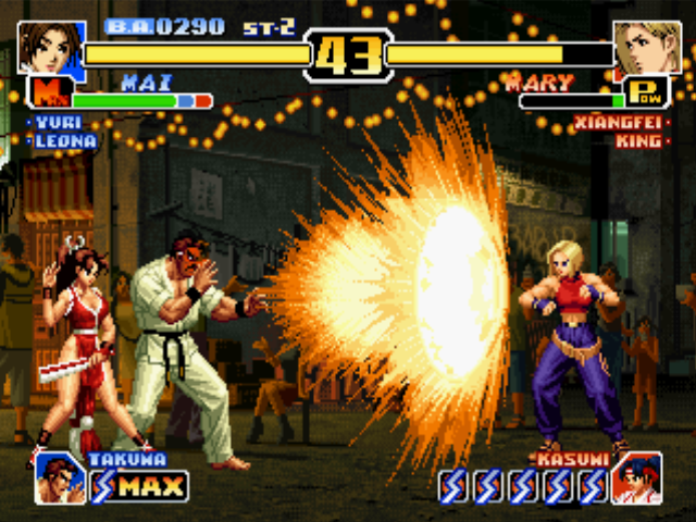 The King of Fighters '99: Millennium Battle (PlayStation) screenshot: Mai calls Takuma to attack Mary with his Chou Hissatsu Tengu Shikou Ken, but this attempt fails...