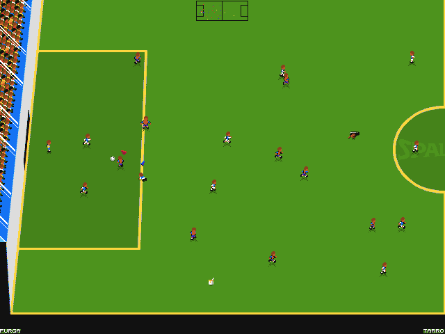 Eat the Whistle (Amiga) screenshot: Red player throws himself before the goalie