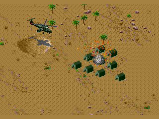 Desert Strike: Return to the Gulf (Genesis) screenshot: Some tents blasted away by our Gunship.