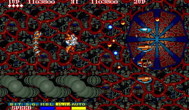 Side Arms Hyper Dyne (Arcade) screenshot: Level 8: Arachnid scenario.<br> Resembles the realm of a giant mechanical arachnid and some intestines. But forget it, it's not... It's another Cephalopoda's (sight).