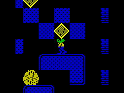 Repton Mania (ZX Spectrum) screenshot: The egg is pushed over and it cracks...