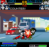 King of Fighters R-2 (Neo Geo Pocket Color) screenshot: Iori stops successfully Saisyu's counter-attack using the body attack command.