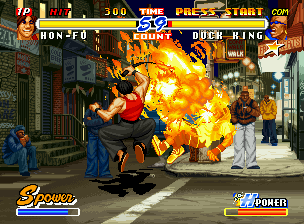 Real Bout Fatal Fury 2: The Newcomers (Neo Geo CD) screenshot: Using his flaming anti-air move Seikuu Rekka Kon, Hon-Fu discontinues Duck King's jump.