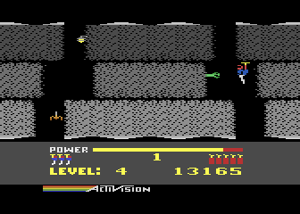 H.E.R.O. (Atari 8-bit) screenshot: Flying down the mineshaft...