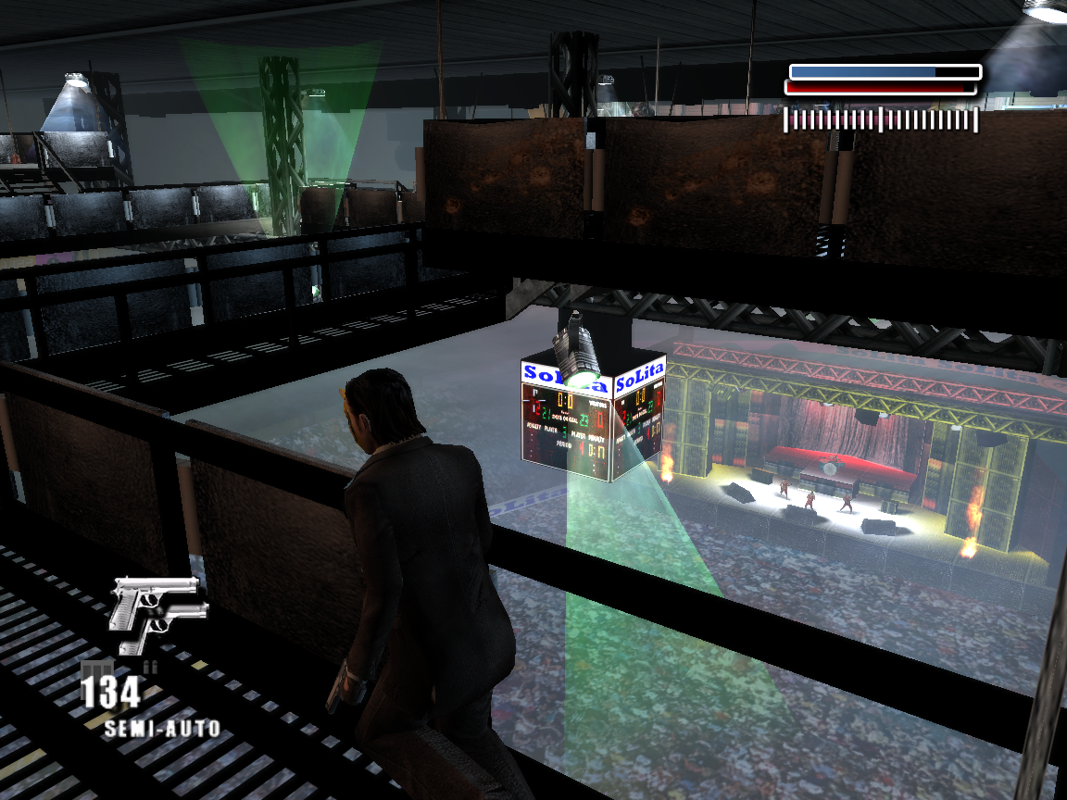 Made Man: Confessions of the Family Blood (Windows) screenshot: In one of the coolest levels in any shooter game you chase the catwalks of this rig while a concert takes place underneath.