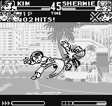 King of Fighters R-1 (Neo Geo Pocket) screenshot: Kim Kaphwan shows a lot of Tae Kwon Do skills to Shermie, starting by his anti-air move Kuu Sa Jin.