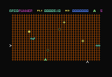 Gridrunner (Commodore 64) screenshot: If you hit the pod-chain in the middle, it splits into two chains.