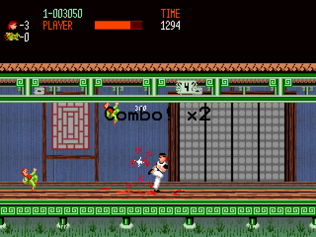 Kung Fu II (Windows) screenshot: Kicking a little guy out of the way and building up a combo.