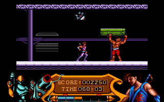 Strider (Amiga) screenshot: Fighting the big wrestler