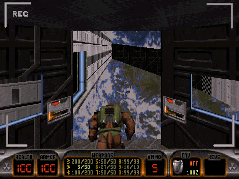 Duke Nukem 3D (DOS) screenshot: Another Alien seen via the security cam... mm kick its tail