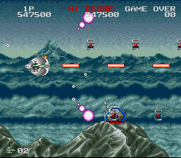 Darius Twin (SNES) screenshot: Shoot that entire group of boxes to release a power up.