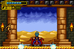The Scorpion King: Sword of Osiris (Game Boy Advance) screenshot: He will attack of diverse forms: in the first one (making this very quaint pose), energy balls will cross the screen in both sides. Jump them and you'll be safe.