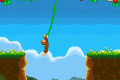 Curious George (Game Boy Advance) screenshot: Like any monkey, George can swing from vines!