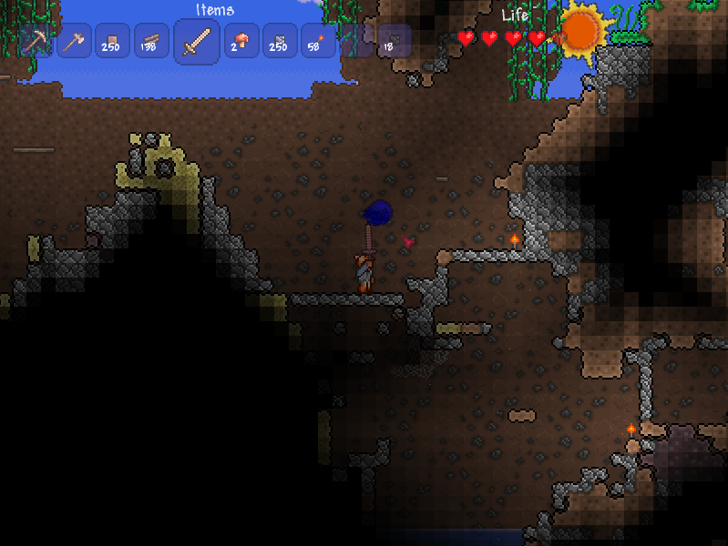 Terraria (Windows) screenshot: Fighting a slime
