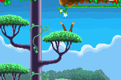 Curious George (Game Boy Advance) screenshot: George climbs through the canopy