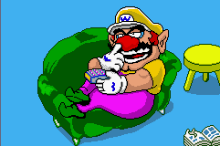 WarioWare, Inc.: Mega Microgame$! (Game Boy Advance) screenshot: Wario lying on his couch and pickin' at it.