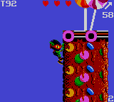 Zool (Game Gear) screenshot: Climbing like a real ninja ant