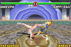 Mortal Kombat: Tournament Edition (Game Boy Advance) screenshot: Vulnerable for a fast moment, Johnny Cage was easily struck by Sareena's Flip Kick move!