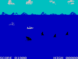 Aquaplane (ZX Spectrum) screenshot: Sharks actually follow you rather than blindly sailing along