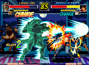 Kizuna Encounter: Super Tag Battle (Neo Geo) screenshot: Now, to hit-damage Rosa, King Leo utilizes all the massive strength of his super move King Straight!