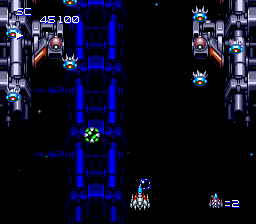 Super Star Soldier (TurboGrafx-16) screenshot: Grab the green pod for a power up