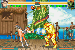 Super Street Fighter II: Turbo Revival (Game Boy Advance) screenshot: Blanka assumes his guard position to decrease a lot of Chun-Li's Kikoken damage.