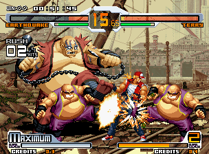 SVC Chaos: SNK vs. Capcom (Neo Geo) screenshot: Earthquake have some help from two little bad guys in his Exceed Fat Carnival.