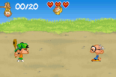 Kid Paddle (Game Boy Advance) screenshot: Mini game: Hit the severed doll heads Horace throws at Kid with a bat.